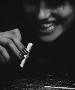 woman-holding-a-blunt-1089423